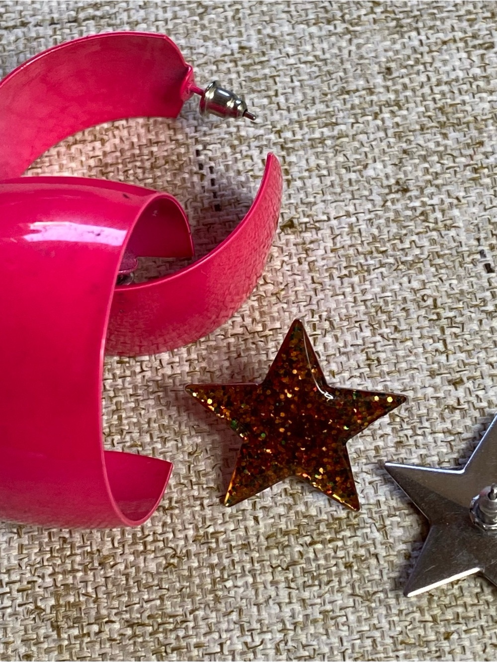 Two pairs of metal earrings from the 80s.